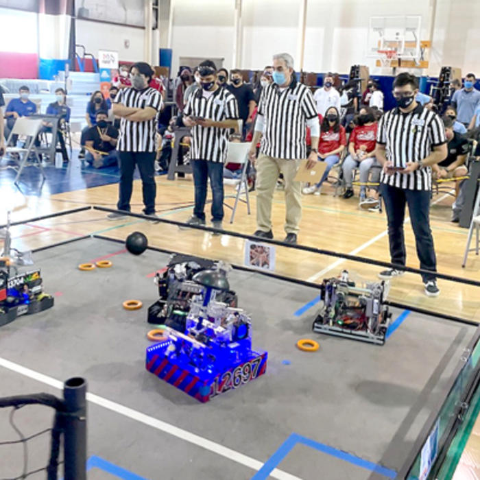 Students in the FIRST Robotics program in McAllen, Texas, show off their creations